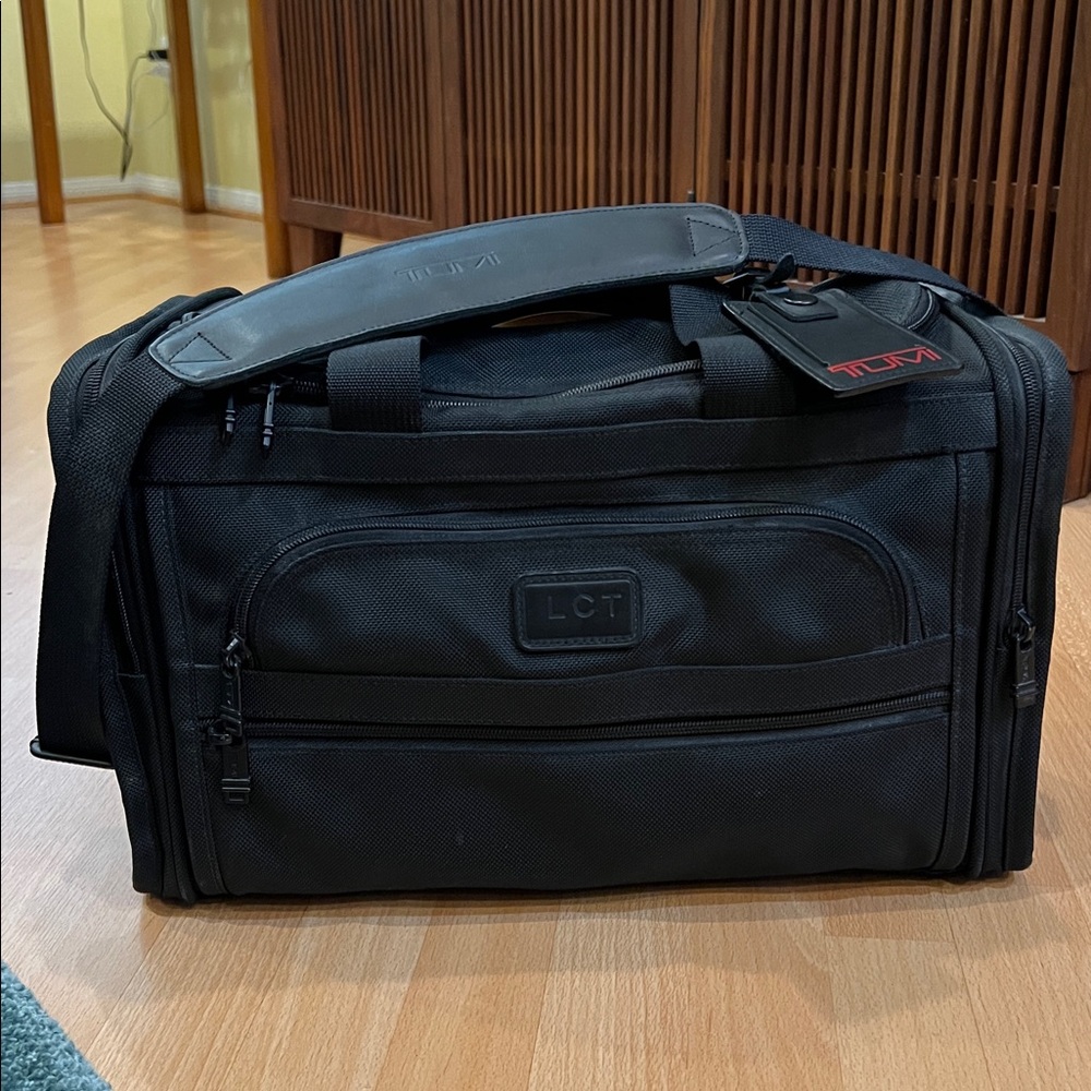 Tumi black Travel Bag. Gently used